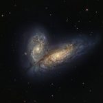 В космосе удалось заснять слияние двух галактик-«бабочек». Фото